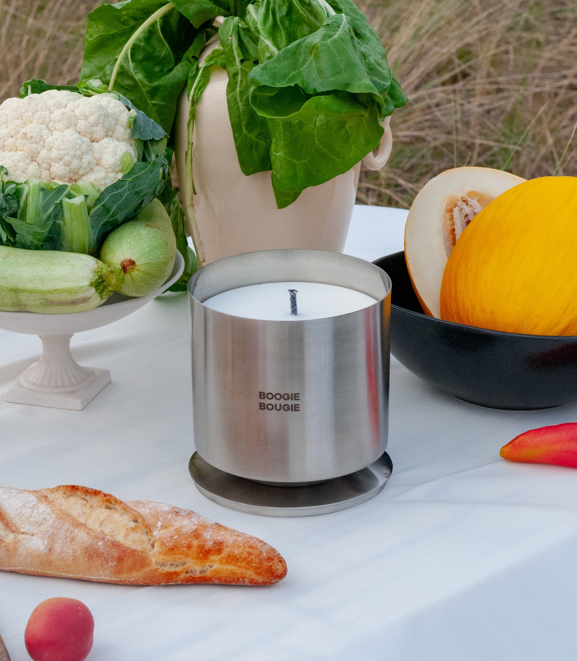 The Outdoor Candle 'Tamed Basil & Thunder'